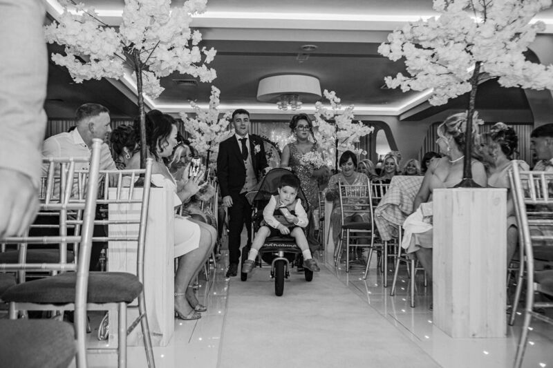 Sons Jordan and Jackson, with Sandra’s niece Danielle, at the wedding ceremony.