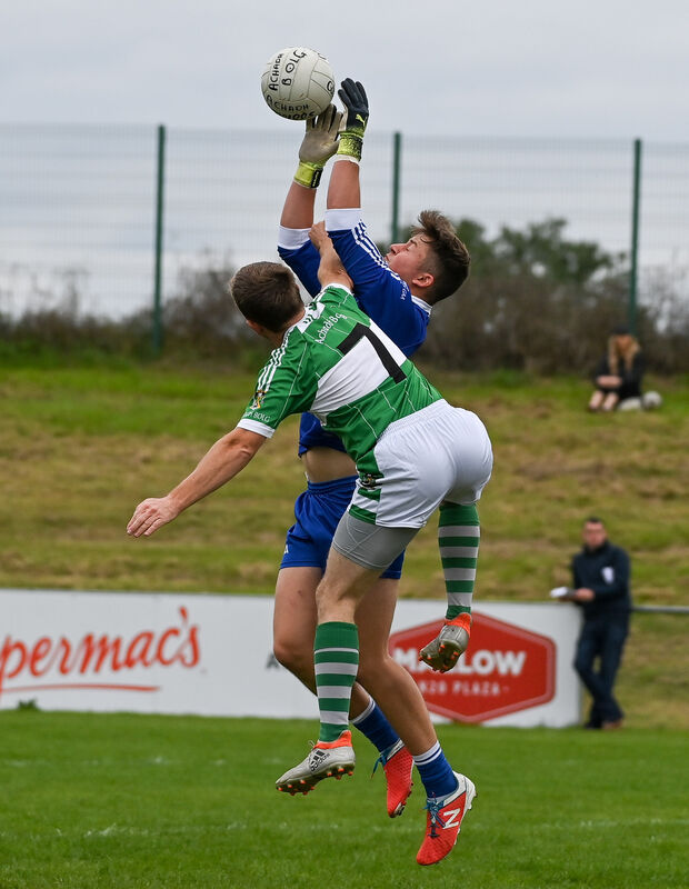 Kildorrery goalkeeper Tony Watson wins the ball under pressure from Aghabullogue's Denis Quinlan. Picture: David Keane Kildorrery goalkeeper Tony Watson wins the ball under pressure from Aghabullogue's Denis Quinlan. Picture: David Keane