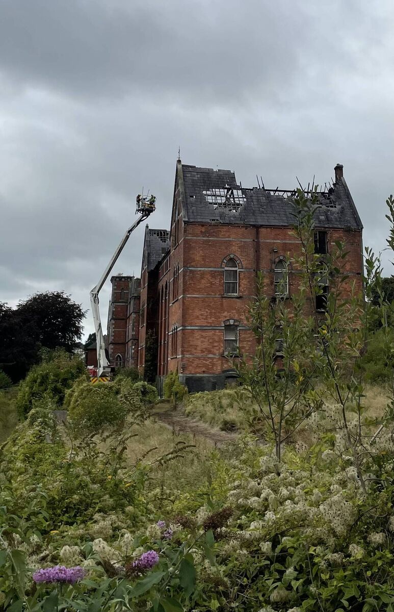 Fire crews from Anglesea Street tending the ruins of the former Good Shepherd Convent in Sunday's Well in Cork, some 12 hours after a fire broke out in the former Magdalene laundry, mother and baby home and orphanage. Picture: Donal O'Keeffe.
