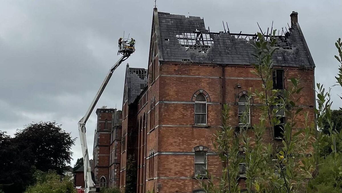 Fire crews from Anglesea Street tending the ruins of the former Good Shepherd Convent in Sunday's Well in Cork, some 12 hours after a fire broke out in the former Magdalene laundry, mother and baby home and orphanage. Picture: Donal O'Keeffe.