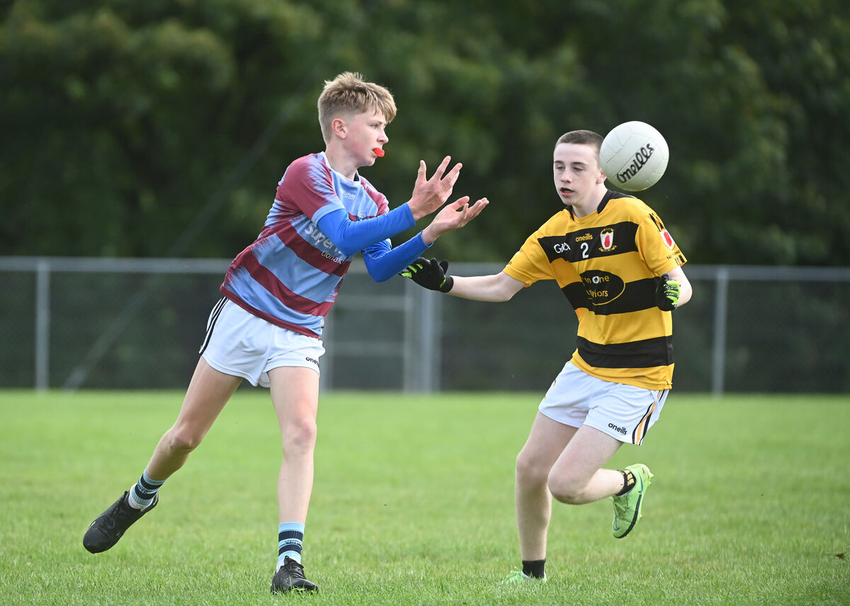  Mike Collins in action for Ibane Gaels against defender Brian Kelly, Na Piarsaigh. Picture: Larry Cummins