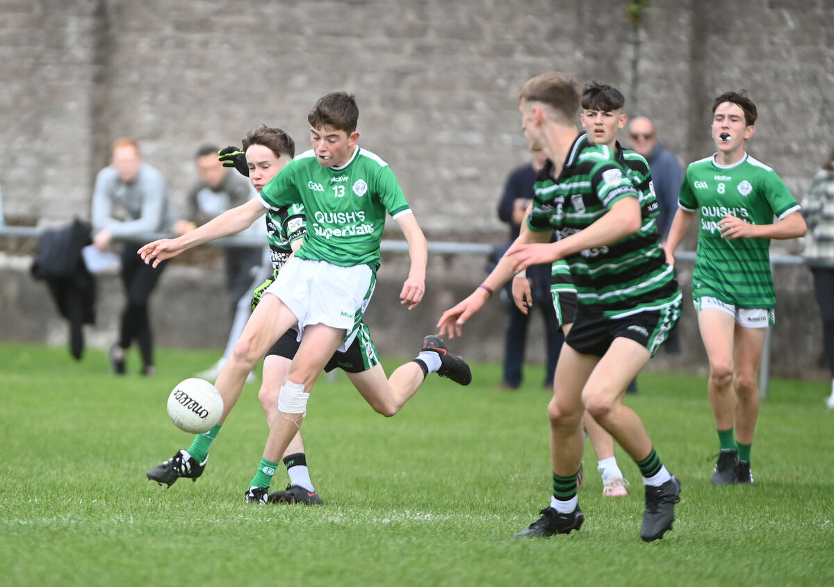  Patrick McCarthy kicks a point for Ballincollig against Douglas in the Rebel Óg U15 Football Championship final at Mardyke on Saturday. Picture: Larry Cummins