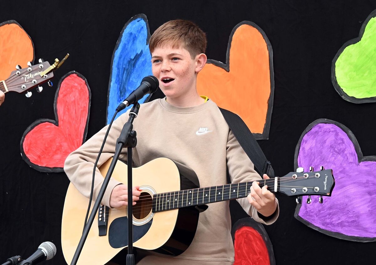 Conor Nolan singing at the launch of his debut single, On my holidays, at Scoil Mhuire Naofa, Carrigtwohill, which won the school's song writing competition 2022 when he was in sixth class. Picture Denis Minihane.