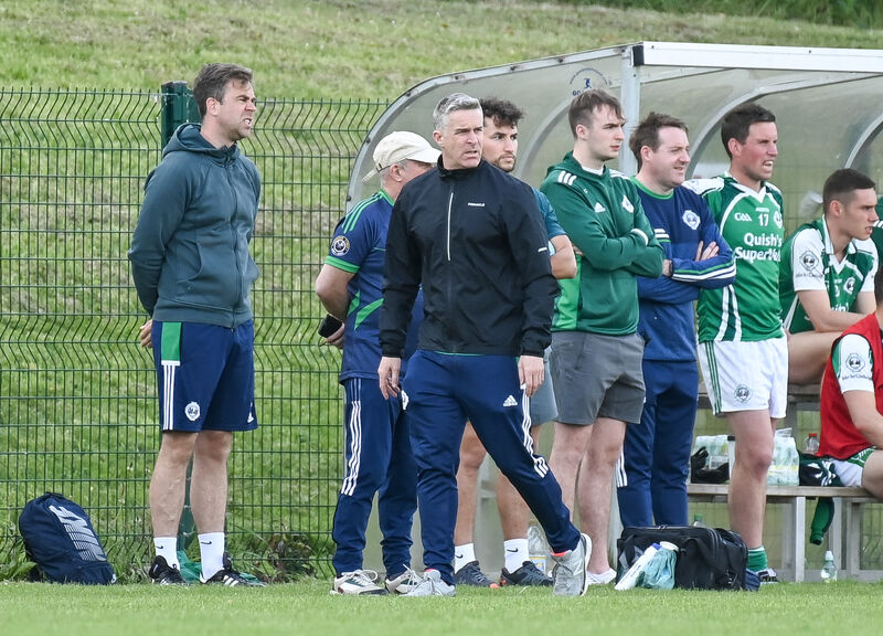  Ballincollig mentors, including manager Podsie O'Mahony and selector Niall Allen, on the sideline. Picture: David Keane