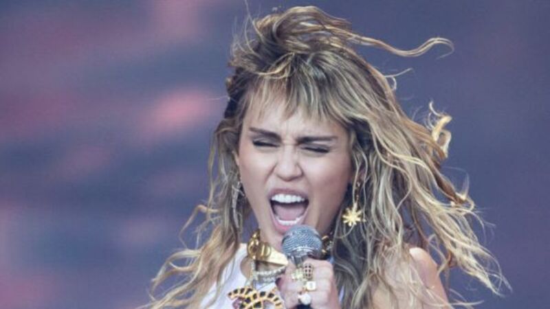 Miley Cyrus remembers Taylor Hawkins as 'my friend, my idol and my neighbour' Miley Cyrus remembers Taylor Hawkins as 'my friend, my idol and my neighbour'