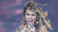 Miley Cyrus remembers Taylor Hawkins as 'my friend, my idol and my neighbour'