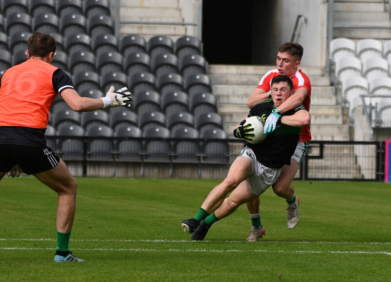 Nemo Rangers' Mark Cronin is fouled by Ballincollig's Luke Fahy for the penalty in the Bon Secours Cork Premier SFC semi-final at Páirc Uí Chaoimh. Picture; Eddie O'Hare