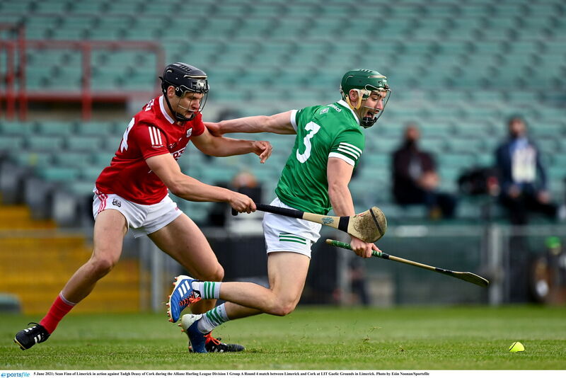 Sean Finn of Limerick in action against Tadhg Deasy of Cork. Picture: Eóin Noonan/Sportsfile Sean Finn of Limerick in action against Tadhg Deasy of Cork. Picture: Eóin Noonan/Sportsfile