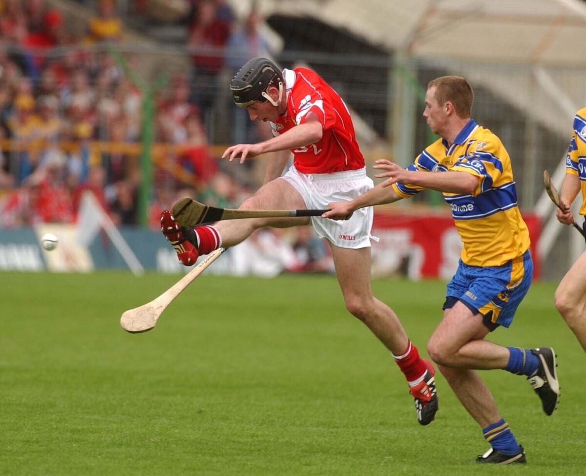 Cork's John Gardiner boots the ball upfield against Clare in 2003. Picture: Eddie O'Hare