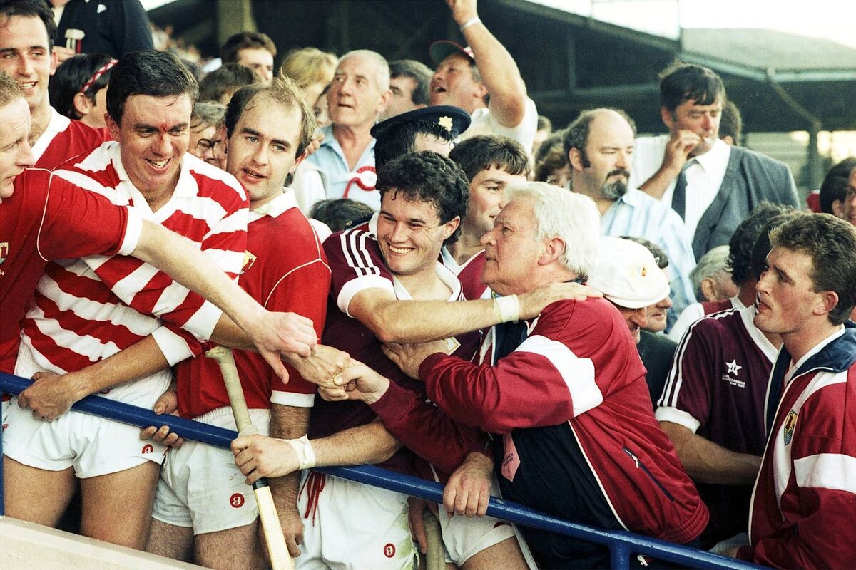 Celebration time for Ger Cunningham, Brendan O'Sullivan, Denis Walsh and coach Fr Michael O'Brien in 1990.