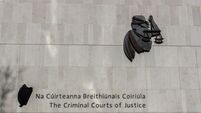 Knife-wielding mother who drenched infant son in boiling water is jailed for seven years
