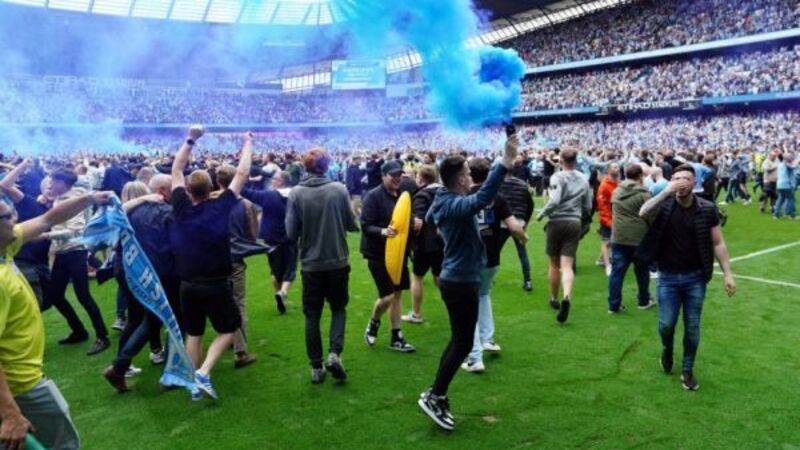 Manchester City fined over pitch invasion to celebrate Premier League title win