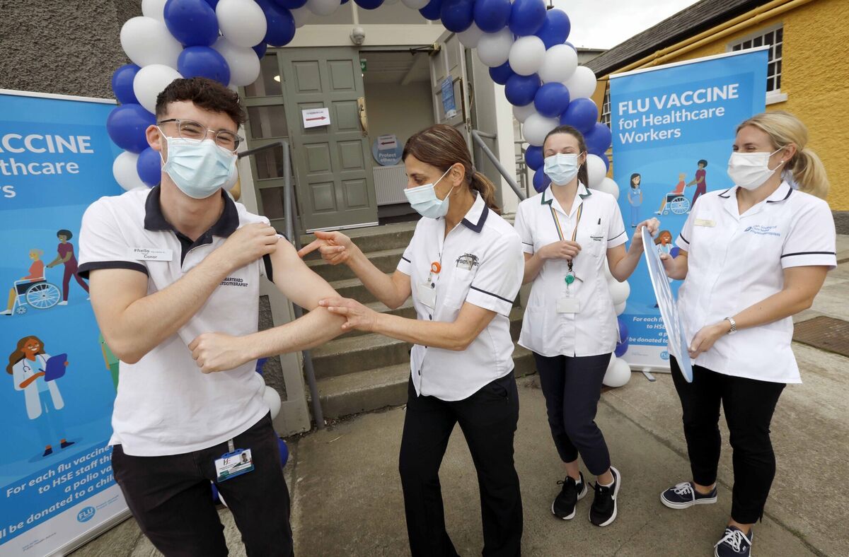 HSE Staff at St. Mary’s Hospital in Phoenix Park received their flu vaccines as the the winter vaccine programme is launched nationwide. Pictured having a bit of fun while waiting for their turn are, from left, Conor Duignan, Tatiana McManus, Aoife Ní Riain and Tara Mills. PHOTO: Mark Stedman.