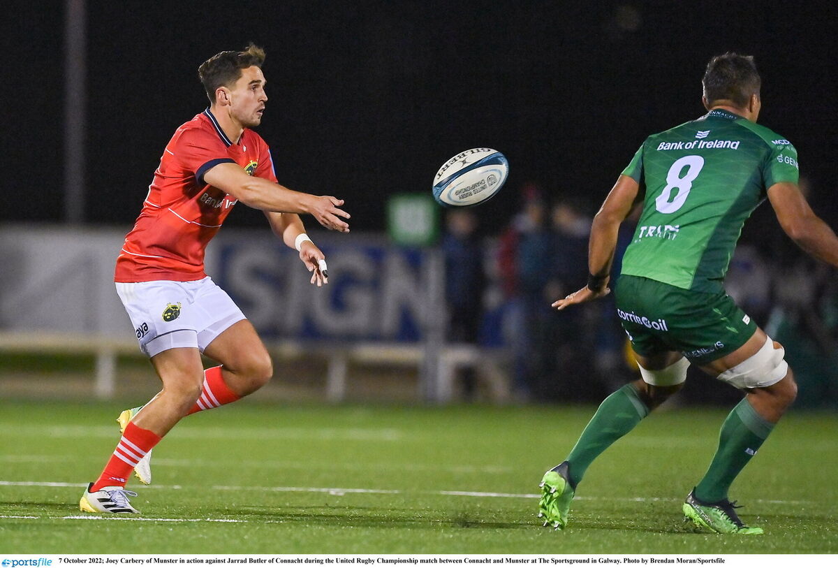  Joey Carbery of Munster in action against Jarrad Butler of Connacht. Picture: Brendan Moran/Sportsfile