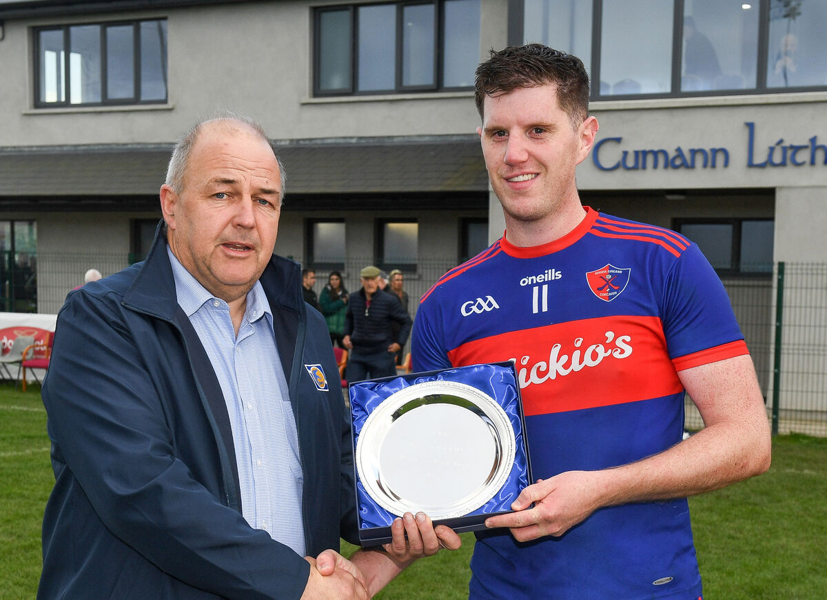 Con Ryan of East Cork Oil presenting the Man-of-the-Match award to Erin's Own's Mark Collins. Picture: David Keane Con Ryan of East Cork Oil presenting the Man-of-the-Match award to Erin's Own's Mark Collins. Picture: David Keane