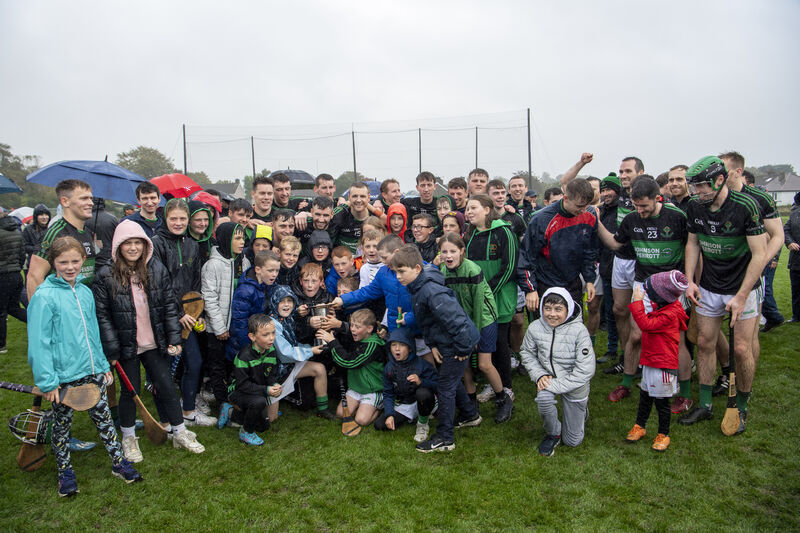 Nemo Rangers Captain Conor Horgan celebrates with his team and young fans after their victory over Brian Dillons in the Seandun City Divison JAHC final match at Ballinlough, Cork. Picture Dan Linehan Nemo Rangers Captain Conor Horgan celebrates with his team and young fans after their victory over Brian Dillons in the Seandun City Divison JAHC final match at Ballinlough, Cork. Picture Dan Linehan