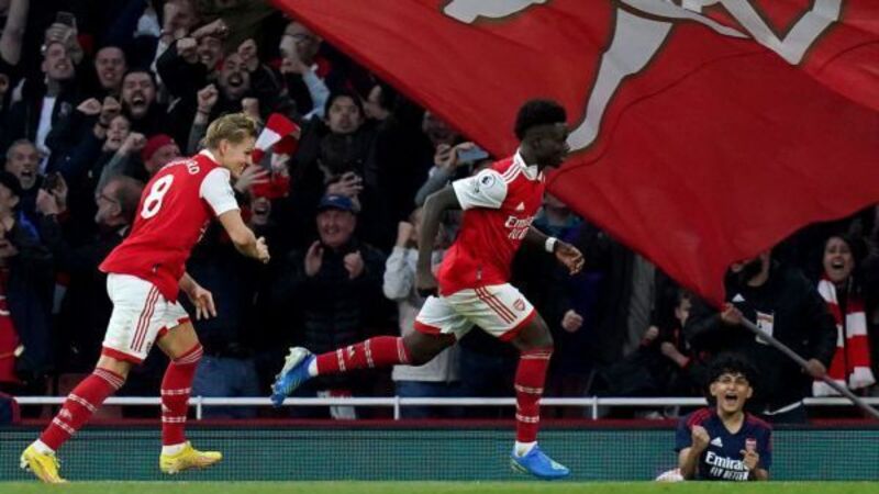 Arsenal back to summit after thrilling win over Liverpool