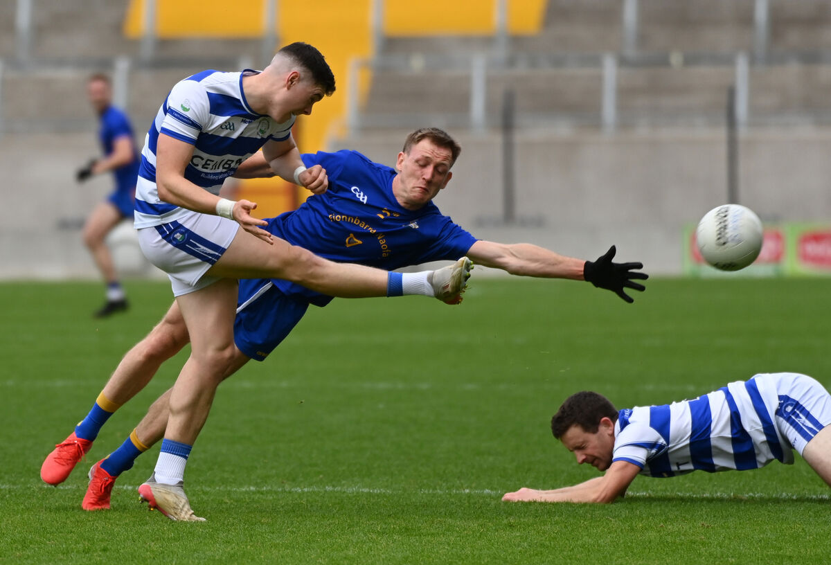 Castlehaven's Rory Maguire clears from St Finbarr's Sam Ryan. Picture: Eddie O'Hare