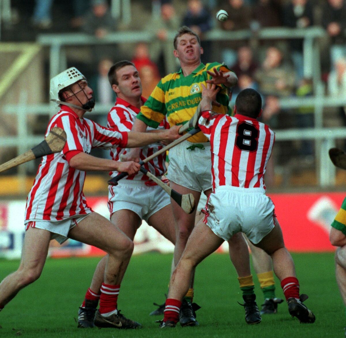 Blackrock's Jim Cashman surrounded by Imokilly players Mark Landers, Derek Barrett and Timmy McCarthy. Picture: Des Barry