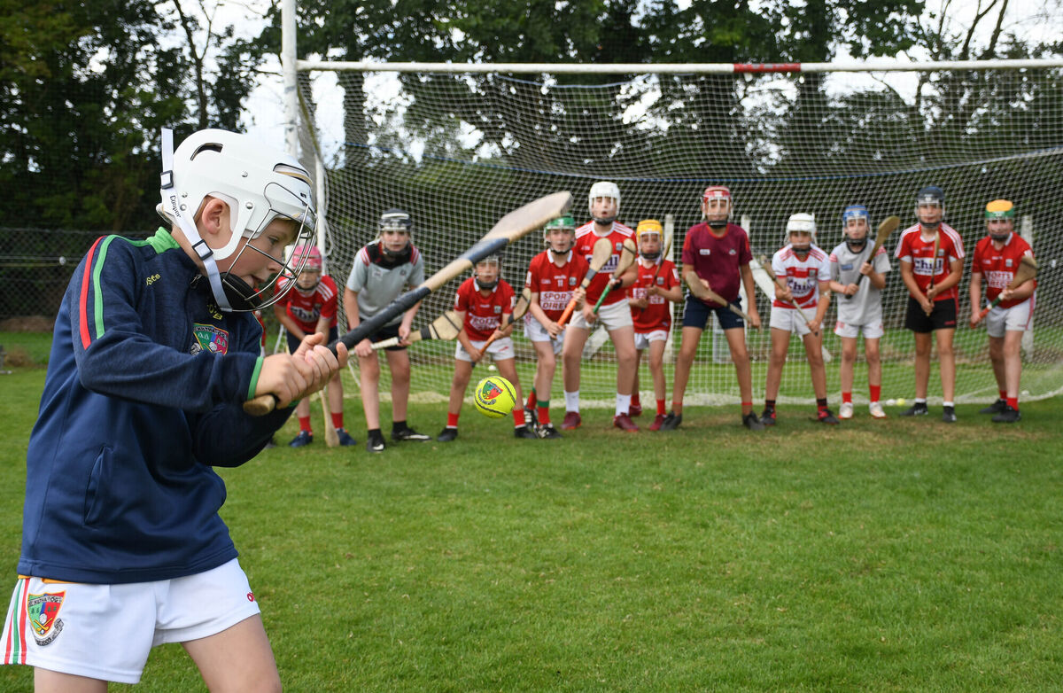 John Forrest takes a shot on goal despite the number of goalkeepers at the Kiltha Óg Cúl Camp at Castlemartyr GAA Club. Picture: Howard Crowdy John Forrest takes a shot on goal despite the number of goalkeepers at the Kiltha Óg Cúl Camp at Castlemartyr GAA Club. Picture: Howard Crowdy