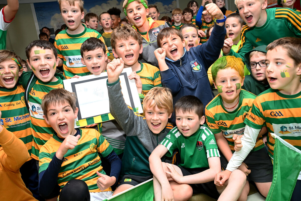  The boys are all set to cheer on Blackrock in the County final against The 'Barrs at Pairc Ui Chaoimh on Sunday. Girls and boys from Beaumont GNS and BNS wore the colours of Blackrock National Hurling Club at school on Thursday. Pic; Larry Cummins