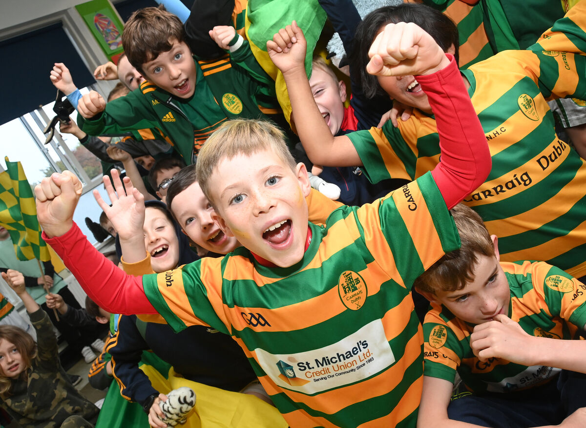  Rory Harrington and the boys are all set to cheer on Blackrock in the County final against The 'Barrs at Pairc Ui Chaoimh on Sunday. Girls and boys from Beaumont GNS and BNS wore the colours of Blackrock National Hurling Club at school on Thursday. Pic; Larry Cummins