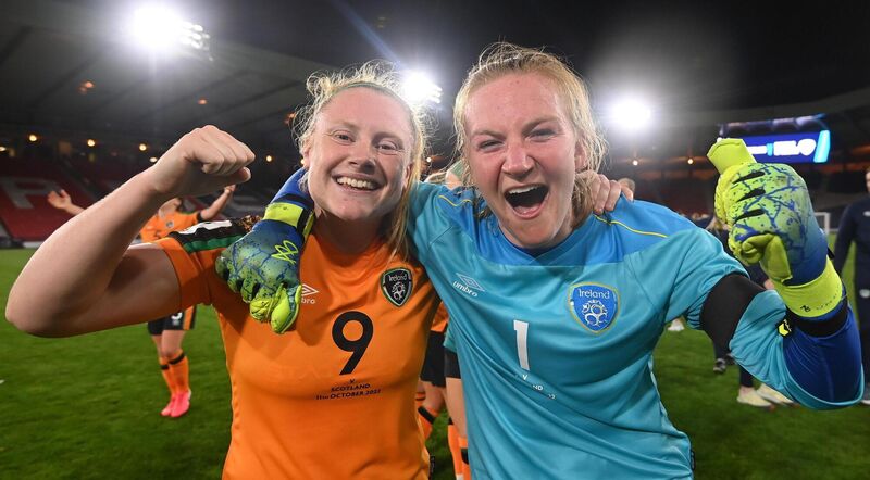 Amber Barrett, left, and Republic of Ireland goalkeeper Courtney Brosnan, who saved a penalty, celebrate after the FIFA Women's World Cup play-off match against  Scotland at Hampden Park. Picture: Stephen McCarthy/Sportsfile