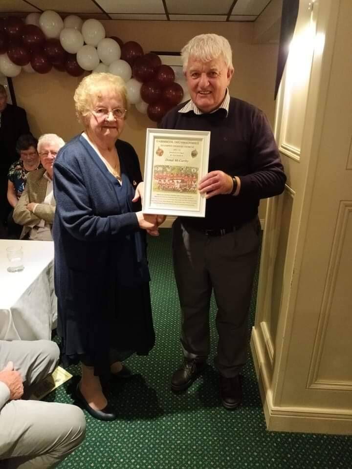 Dunmanway vocational school player Donal McCarthy received a presentation at their recent reunion from Maura Cahalane who taught in the co-educational school. All the players received a presentation of a framed team picture on the night. Dunmanway vocational school player Donal McCarthy received a presentation at their recent reunion from Maura Cahalane who taught in the co-educational school. All the players received a presentation of a framed team picture on the night.