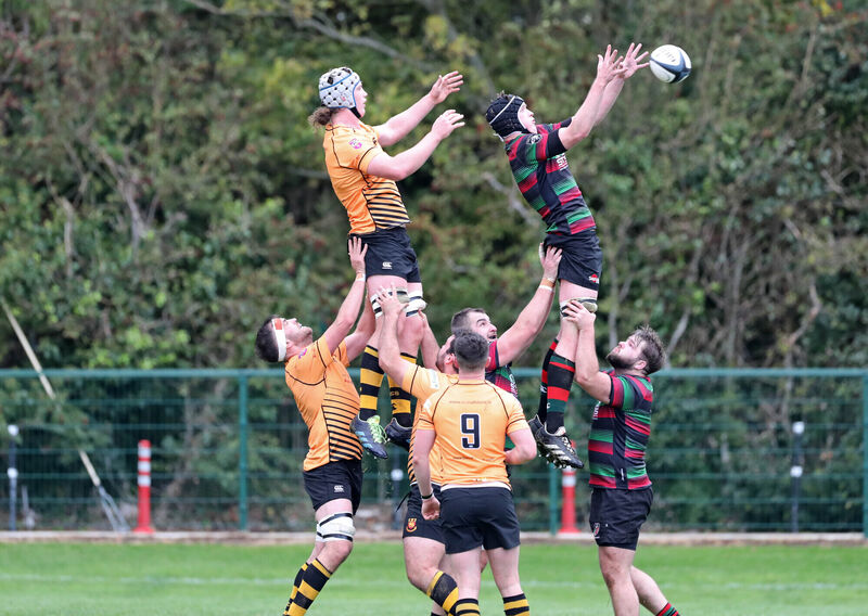  Dave O'Connell, Highfield, rises high with Darragh Murray, Bucaneers, in the AIL Division 1B at Woodleigh Park. Picture: Jim Coughlan.