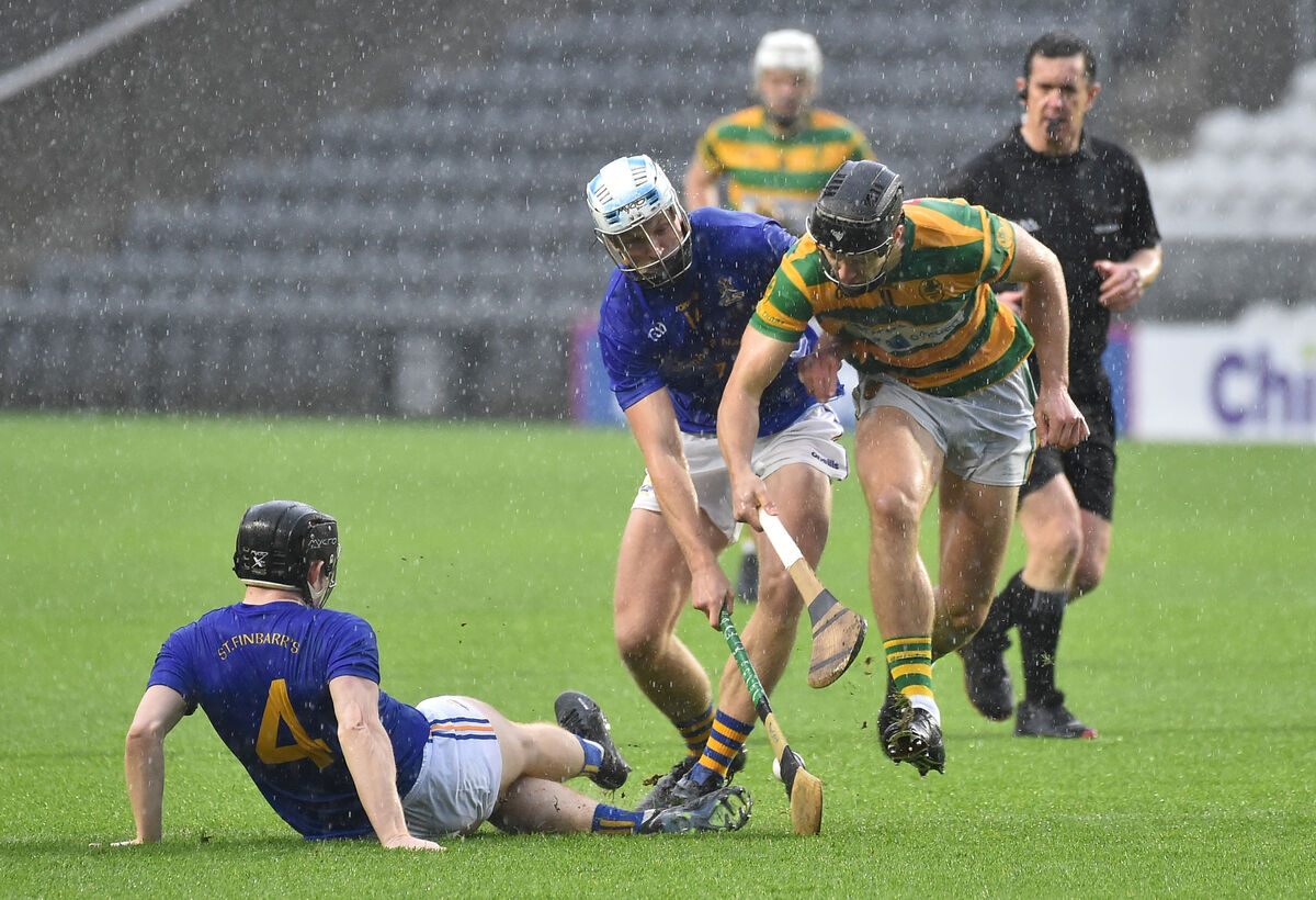  Tadgh Deasy of Blackrock winning the ball from St Finbarr’s duo Cian Walsh and Pádraig Buggy. Picture: Dan Linehan