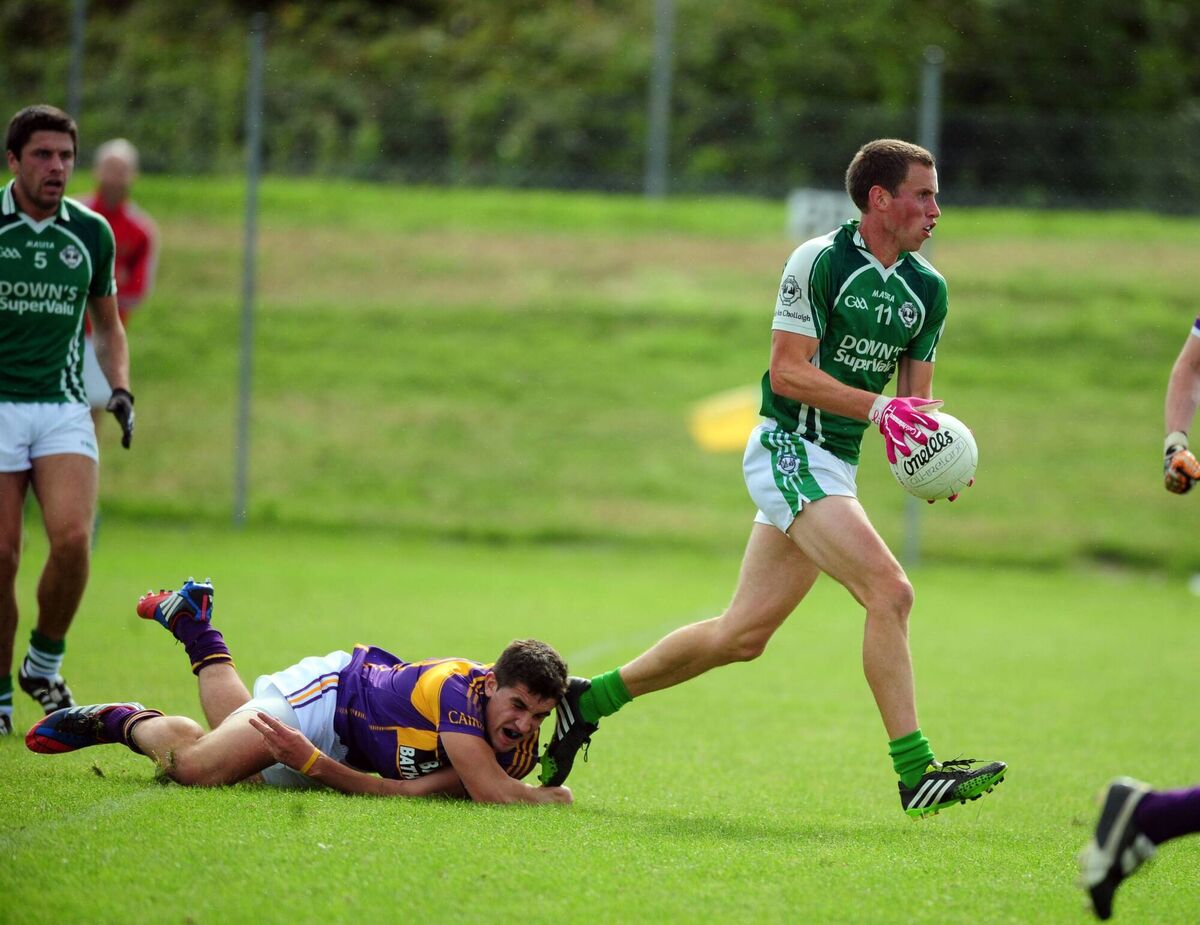 Ballincollig's Patrick Kelly bursting past Carbery player Peter Murphy to score his second goal. Picture: Eddie O'Hare Ballincollig's Patrick Kelly bursting past Carbery player Peter Murphy to score his second goal. Picture: Eddie O'Hare