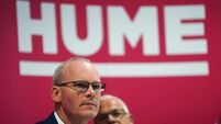 Simon Coveney resumes speech disrupted by bomb scare in March
