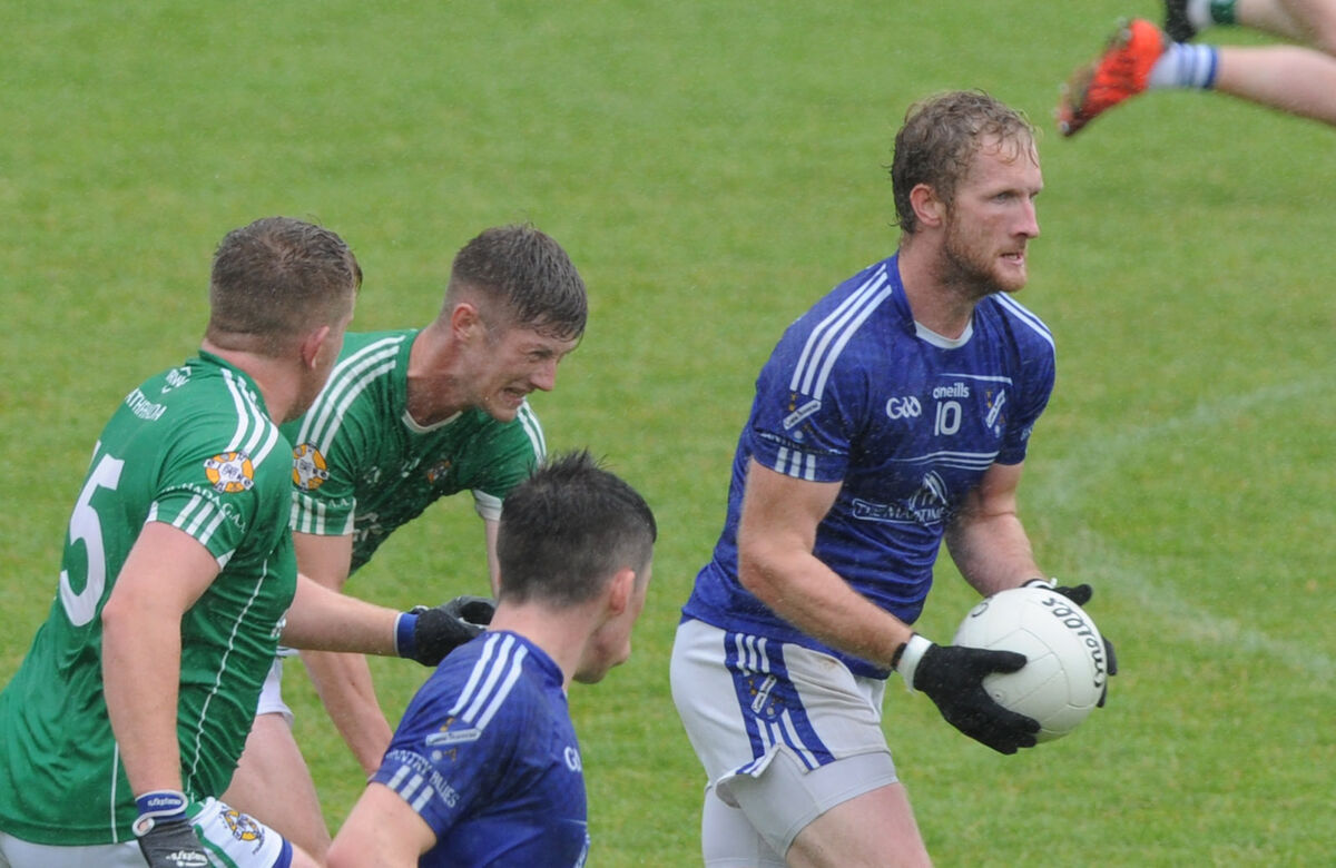 Bantry Blues' Ruairí Deane bursts through the centre against Aghada. Picture: Denis Minihane.