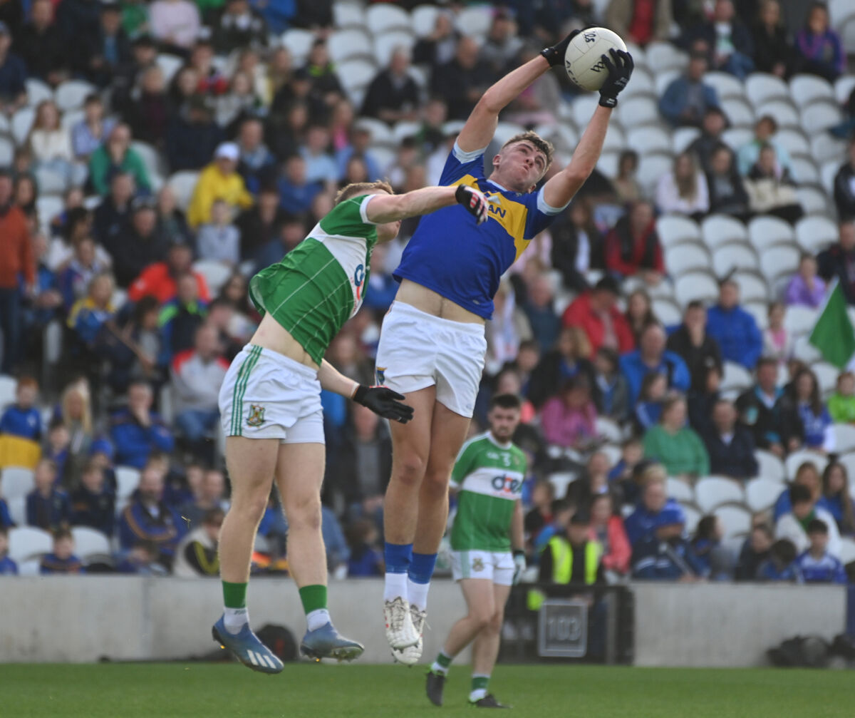 Kilshannig's Eanna O'Hanlon plucks the ball from Aghabullogue's Paul Ring. Picture: Eddie O'Hare
