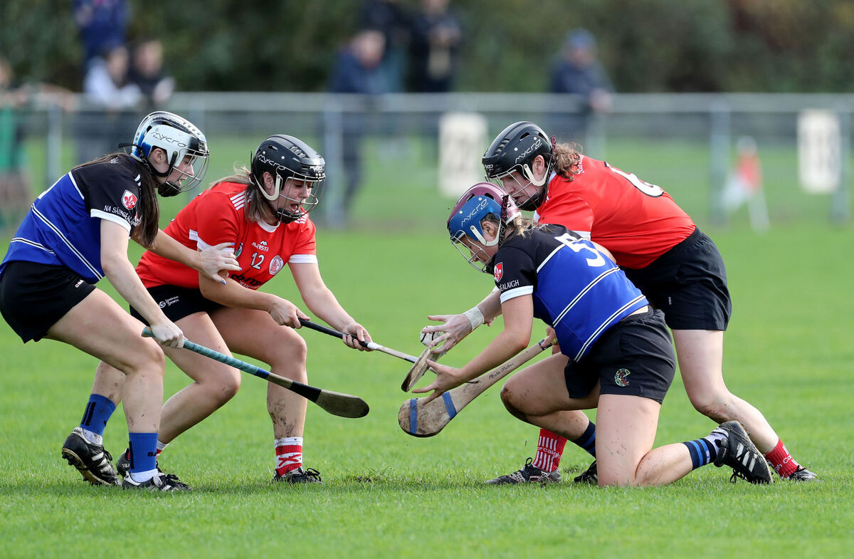  Casey Coleman and Roisin De Faoite, Seandún, battling Cliona Lynch and Meabh Mullins, Sarsfields. Picture: Jim Coughlan.