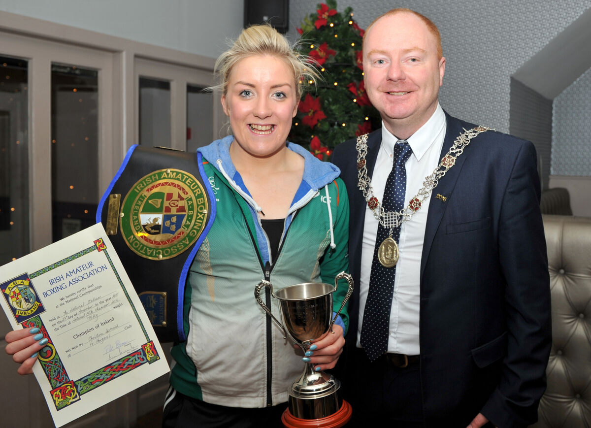 Fr Horgan's BC boxer Christina Demond pictured with Deputy Lord Mayor Cllr. Mick Nugent at a function in the city centre last weekend honouring her achievement in claiming an Irish Elite Title recently, becoming the first Cork boxer to bring a Senior title back to the city since Dr Eanna Falvey in 2002. 
