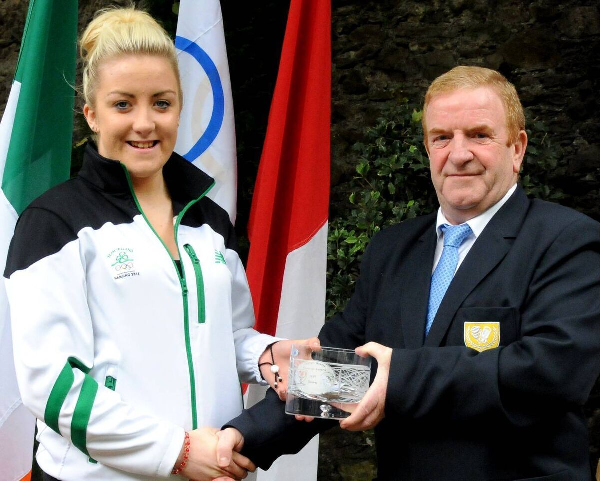 Christina Desmond receives a presentation from JJ Murphy, chairman of the Cork Ex-Boxers Association in Bishop Lucey Park.