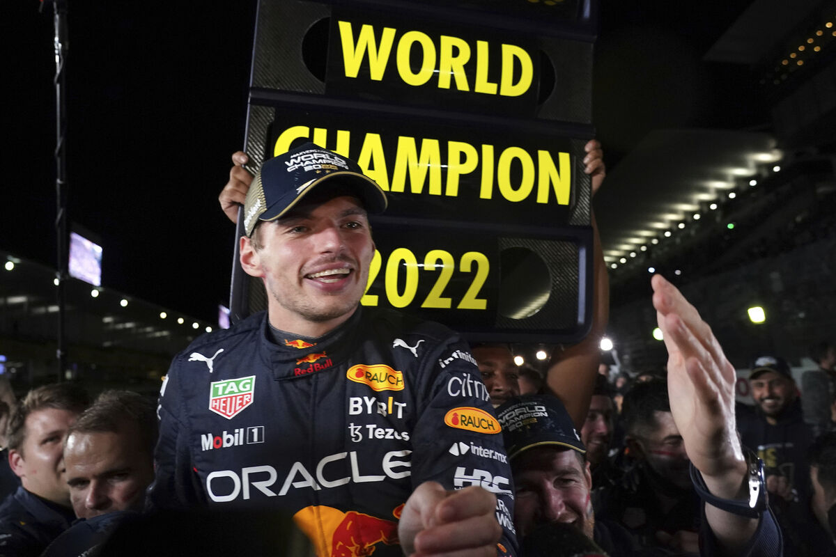 Red Bull driver Max Verstappen of the Netherlands celebrates with teammates as he became F1 drivers world champion, during the Japanese Formula One Grand Prix at the Suzuka Circuit in Suzuka, central Japan, Sunday, Oct. 9, 2022. (AP Photo/Toru Hanai) Red Bull driver Max Verstappen of the Netherlands celebrates with teammates as he became F1 drivers world champion, during the Japanese Formula One Grand Prix at the Suzuka Circuit in Suzuka, central Japan, Sunday, Oct. 9, 2022. (AP Photo/Toru Hanai)