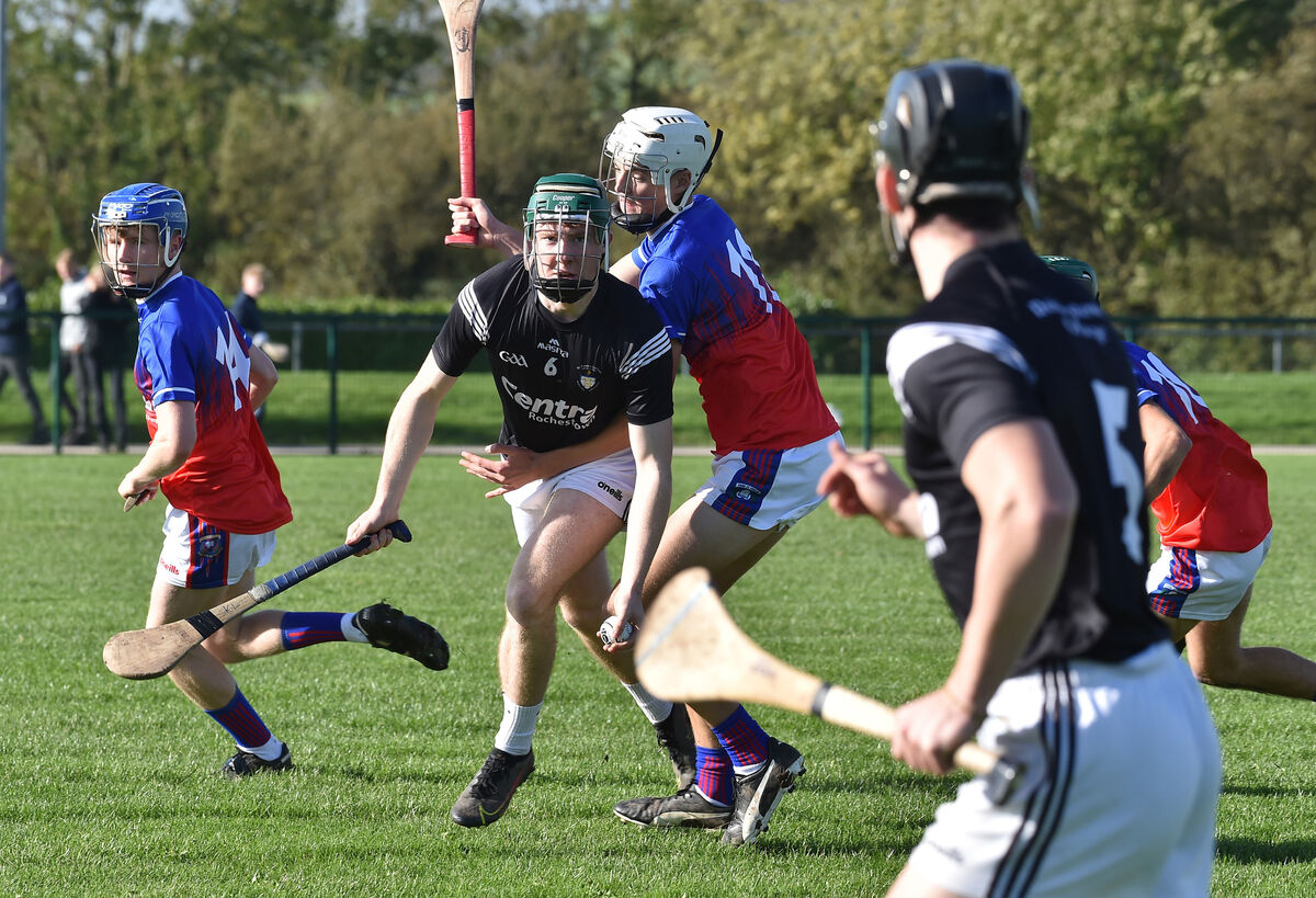  Oisín Mac Toirealaigh, Pobailscoil Na Tríonóide, Youghal getting in a tackle on Kevin Lyons, St Francis College. Picture: Dan Linehan