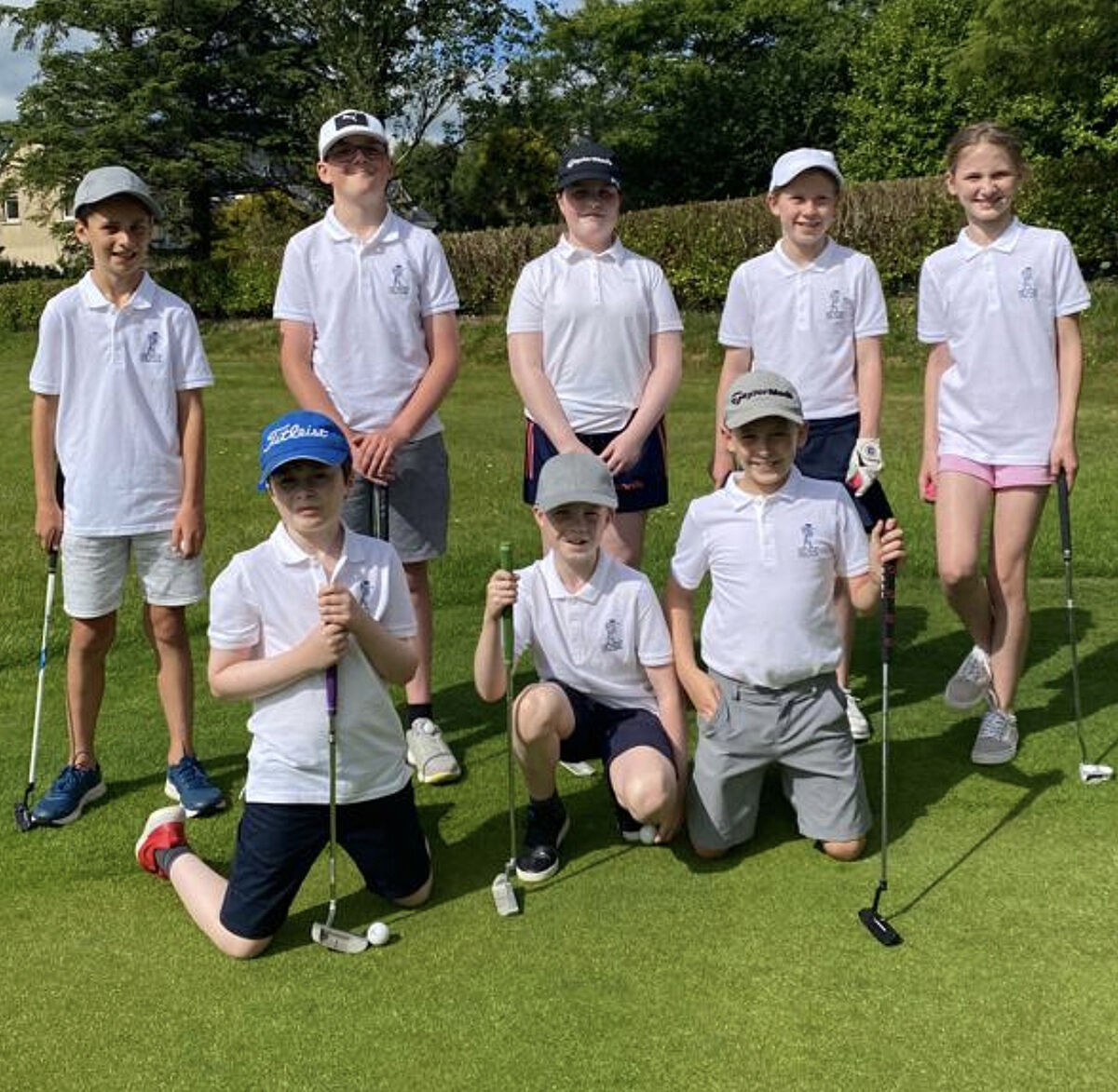 Lee Valley Juniors while practicing at the short game area in Lee Valley.
