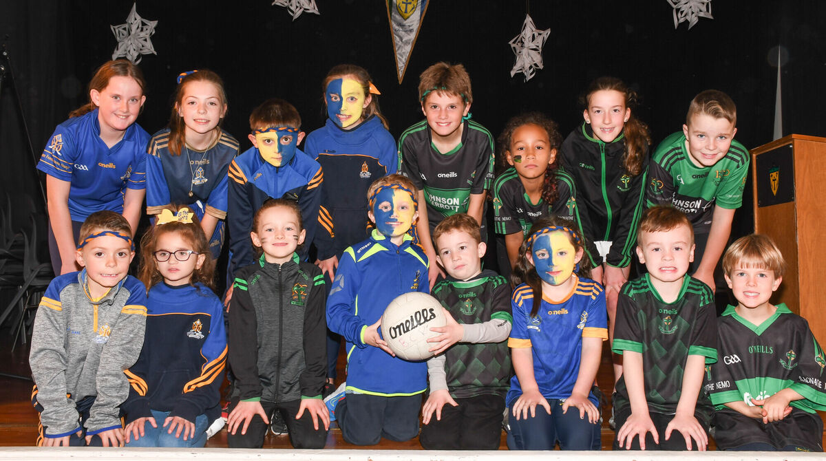 Pupils from Bunscoil Chriost Ri in Turners Cross wearing St Finbarrs and Nemo Rangers jerseys in preparation for the County Final between the sides this coming Sunday. Picture: Howard Crowdy Pupils from Bunscoil Chriost Ri in Turners Cross wearing St Finbarrs and Nemo Rangers jerseys in preparation for the County Final between the sides this coming Sunday. Picture: Howard Crowdy