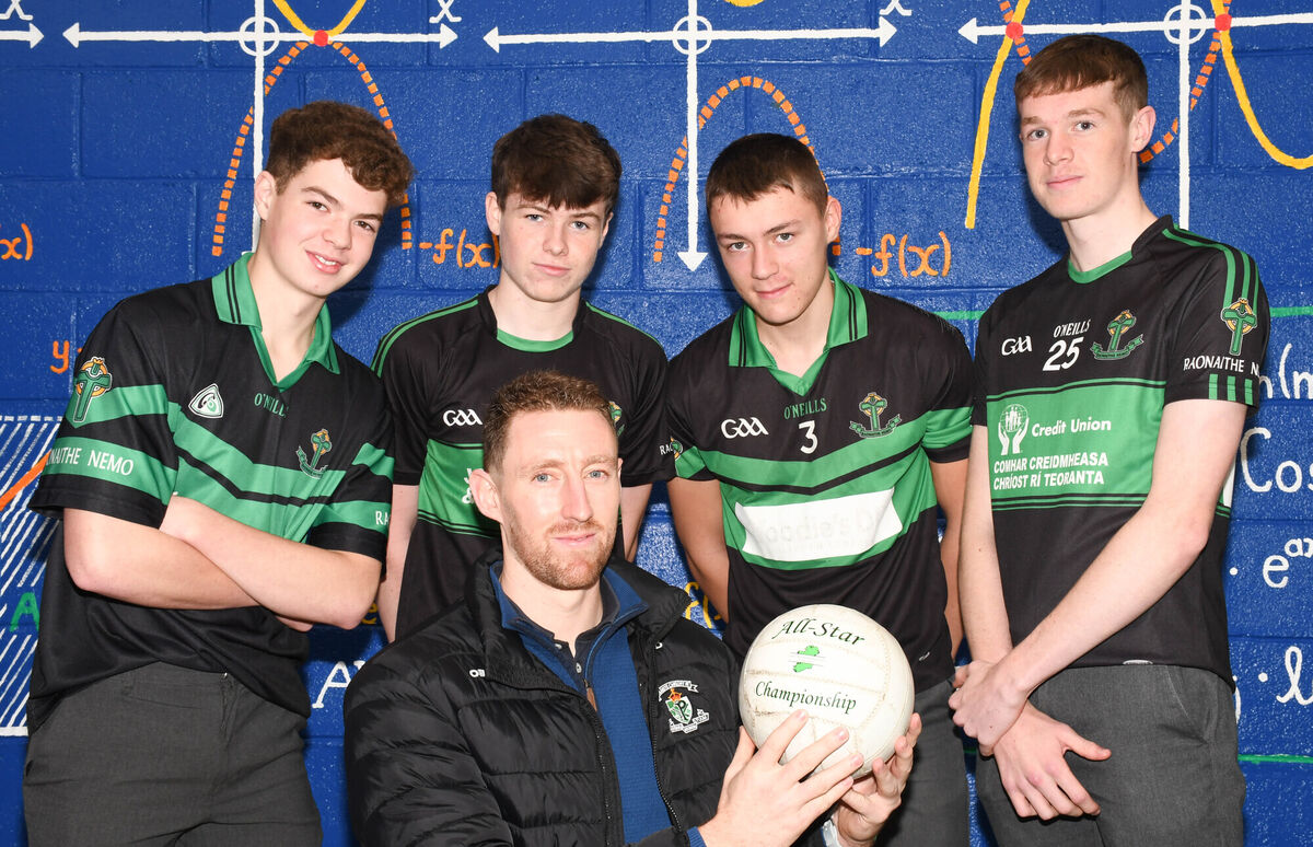 Teacher Jamie Burns of St Finbarrs surrounded by Nemo Rangers supporters Fionn McGorry, Colin Molly, Ryan Clifford and David O'Driscoll as he prepares for the County Final this weekend. Picture: Howard Crowdy Teacher Jamie Burns of St Finbarrs surrounded by Nemo Rangers supporters Fionn McGorry, Colin Molly, Ryan Clifford and David O'Driscoll as he prepares for the County Final this weekend. Picture: Howard Crowdy
