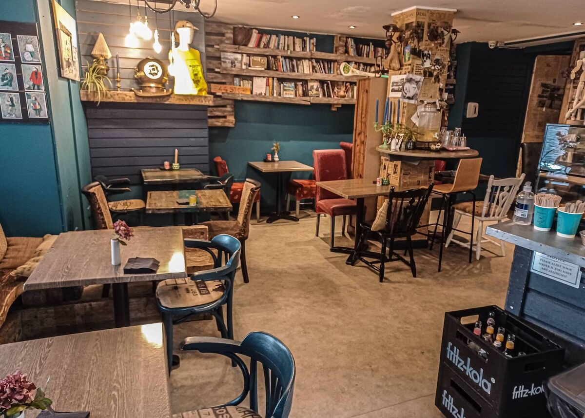 Inside Alchemy Coffee and Bookstore.