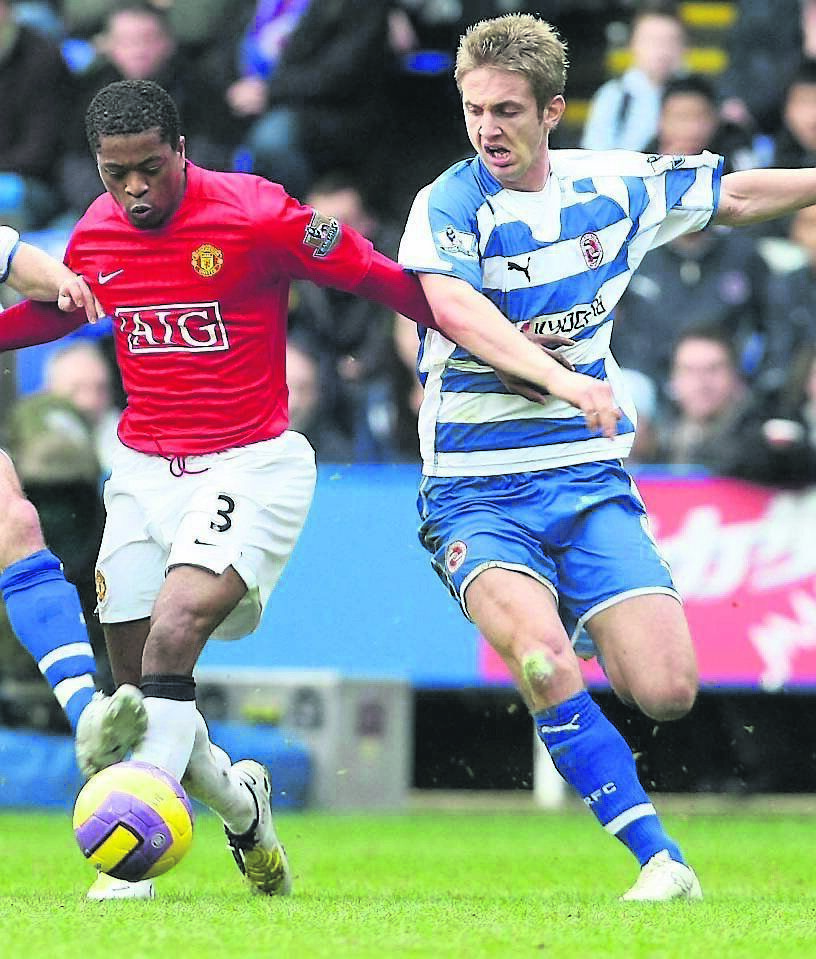 Manchester United’s Patrice Evra clashes with Reading’s Kevin Doyle their Premier League match at the Madejski Stadium in 2008. Picture: John Peters/ via Getty Images
Manchester United’s Patrice Evra clashes with Reading’s Kevin Doyle their Premier League match at the Madejski Stadium in 2008. Picture: John Peters/ via Getty Images