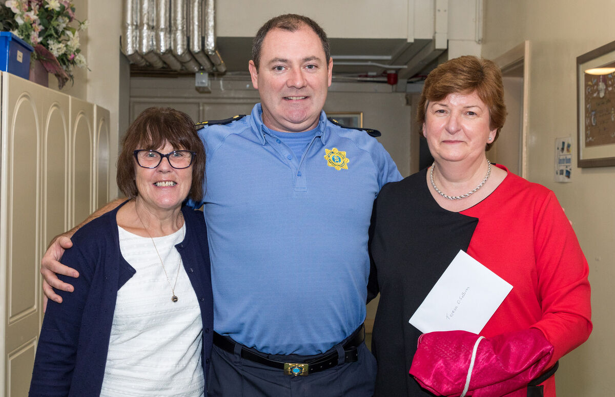 Mary Leahy, Jamie O'Riordan, community guard and principal Teresa O'Sullivan who is retiring after twenty seven years at Scoil Aiseiri Chriost in Farranree, Cork.Picture David Creedon