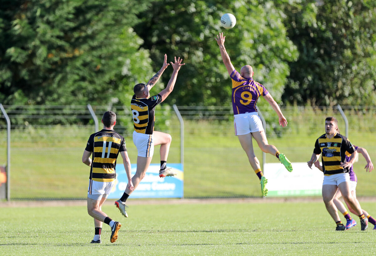  Brian O'Driscoll, Carbery, rises with Sean Walsh, Avondhu. Picture: Jim Coughlan.