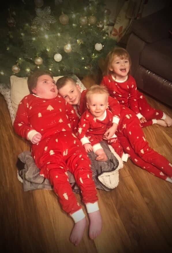 Mark Clifford with his siblings.