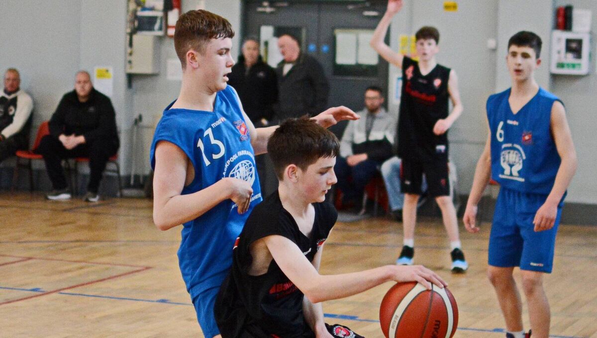 Neptune point guard Dylan O'Rourke puts pressure on Ballincollig Basketball Club's Tadhg Murphy in Parochial Hall. Picture: Mike Moynihan/ Ballincollig BC