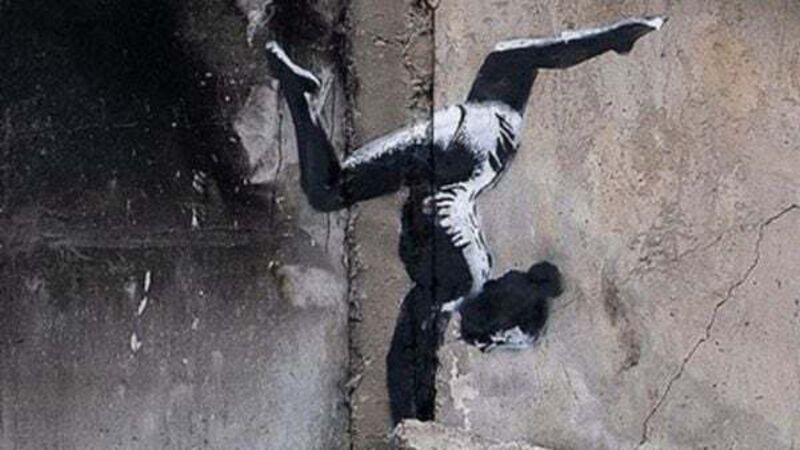 Banksy reveals artwork on side of damaged building in Ukraine Banksy reveals artwork on side of damaged building in Ukraine
