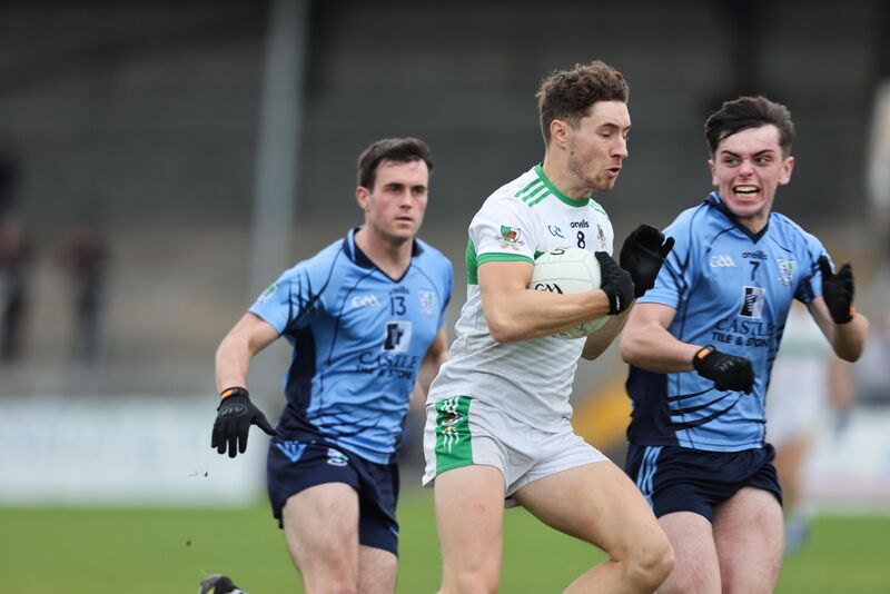 Kanturk's Paul Walsh and Kildysart's Jamie Evans and Fergal Guinnane in action. Picture: Eamon Ward